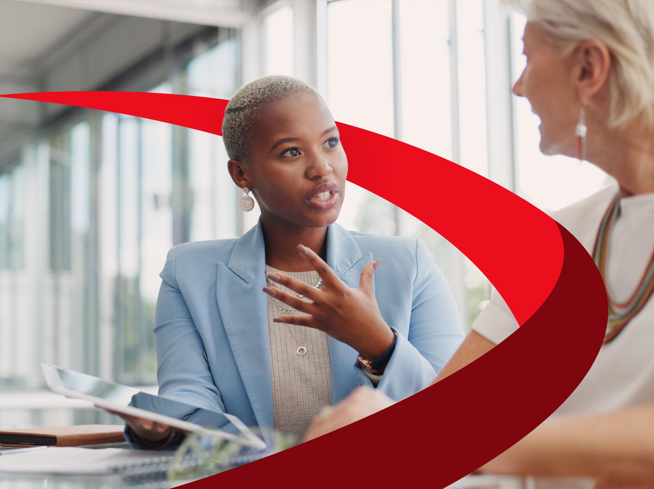 Business professional using emotional intelligence skills to empathize with a co-worker 