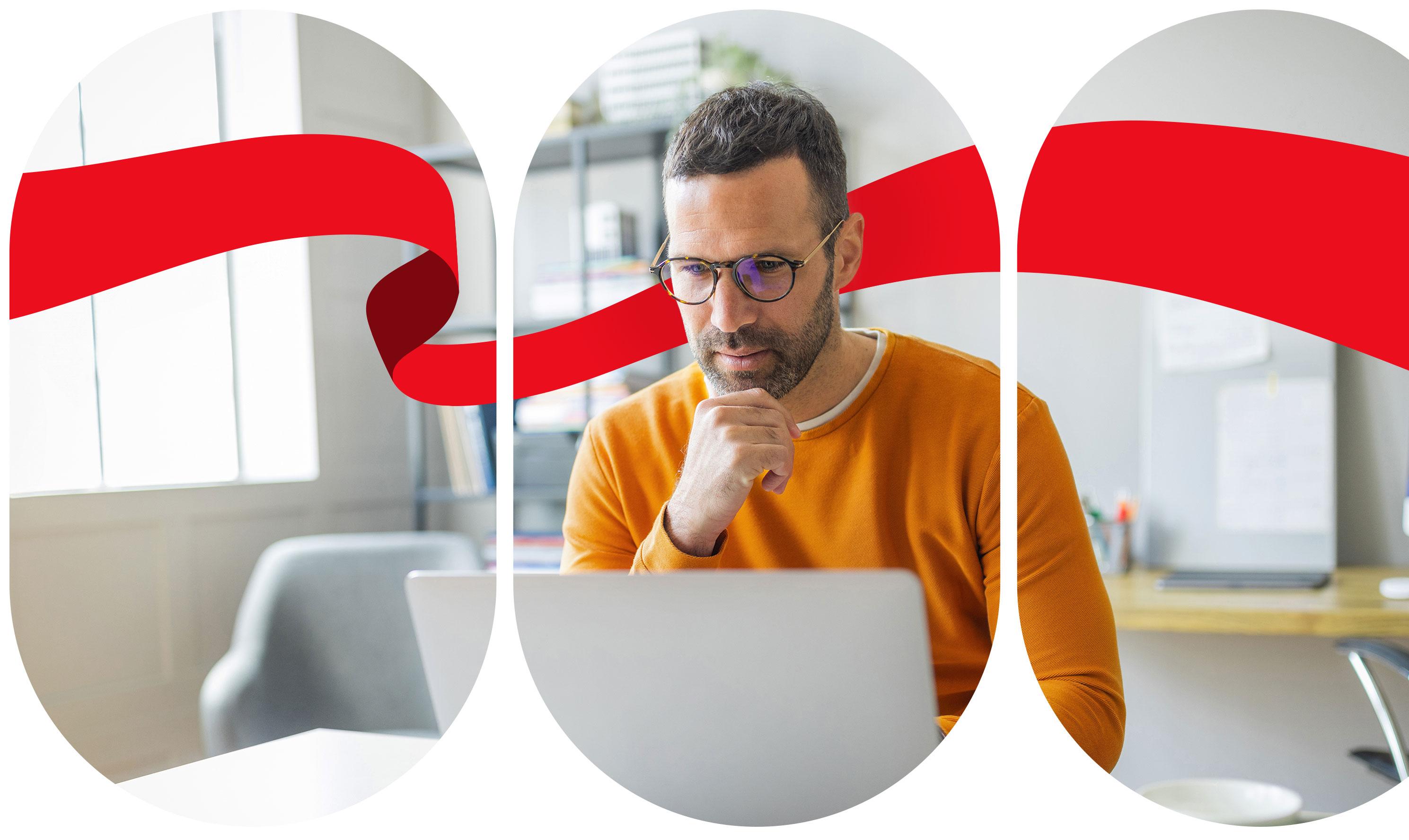 Man thinking and looking at laptop