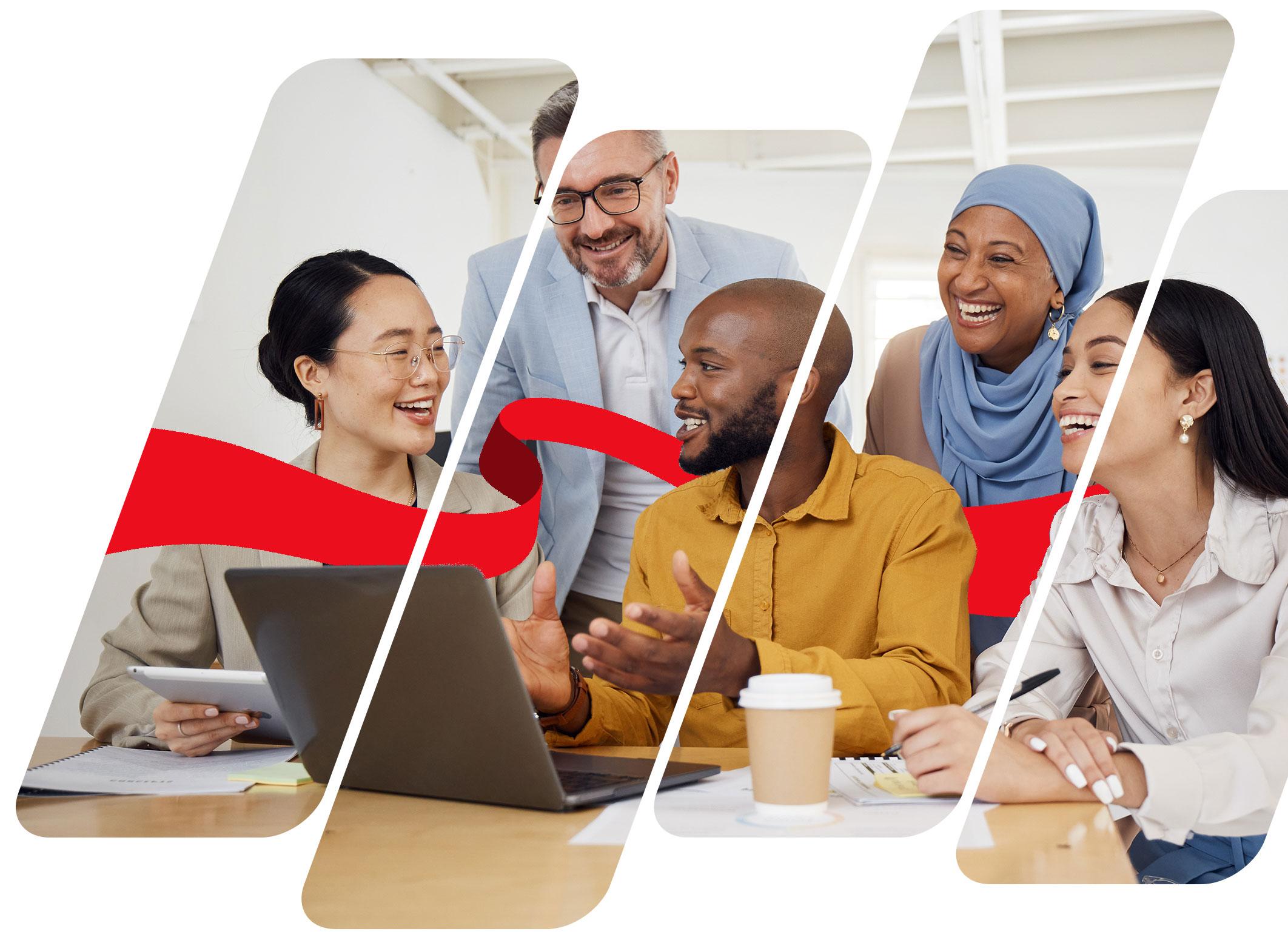 A group of co-workers discussing company processes together in front of a laptop