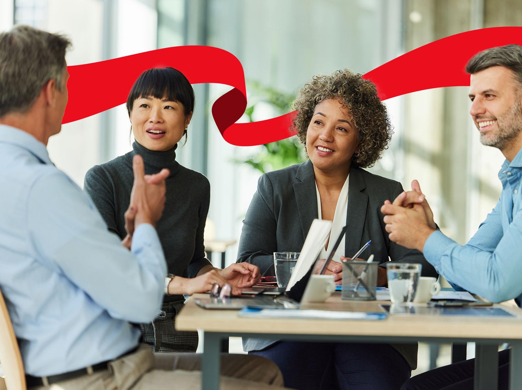 Diverse team of business professionals collaborating on a project