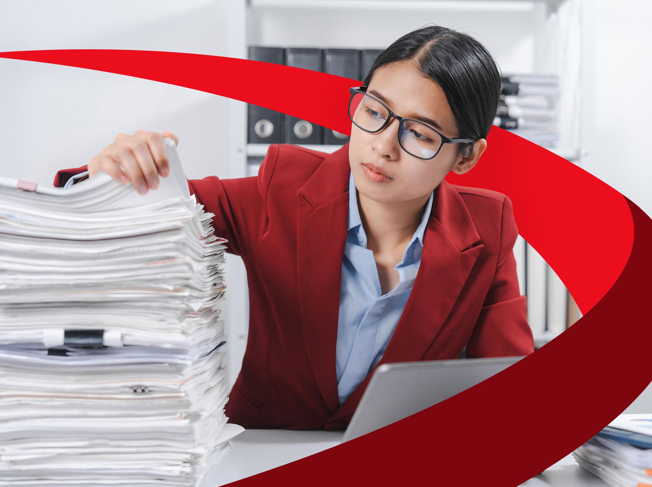 Business professional overwhelmed with tasks