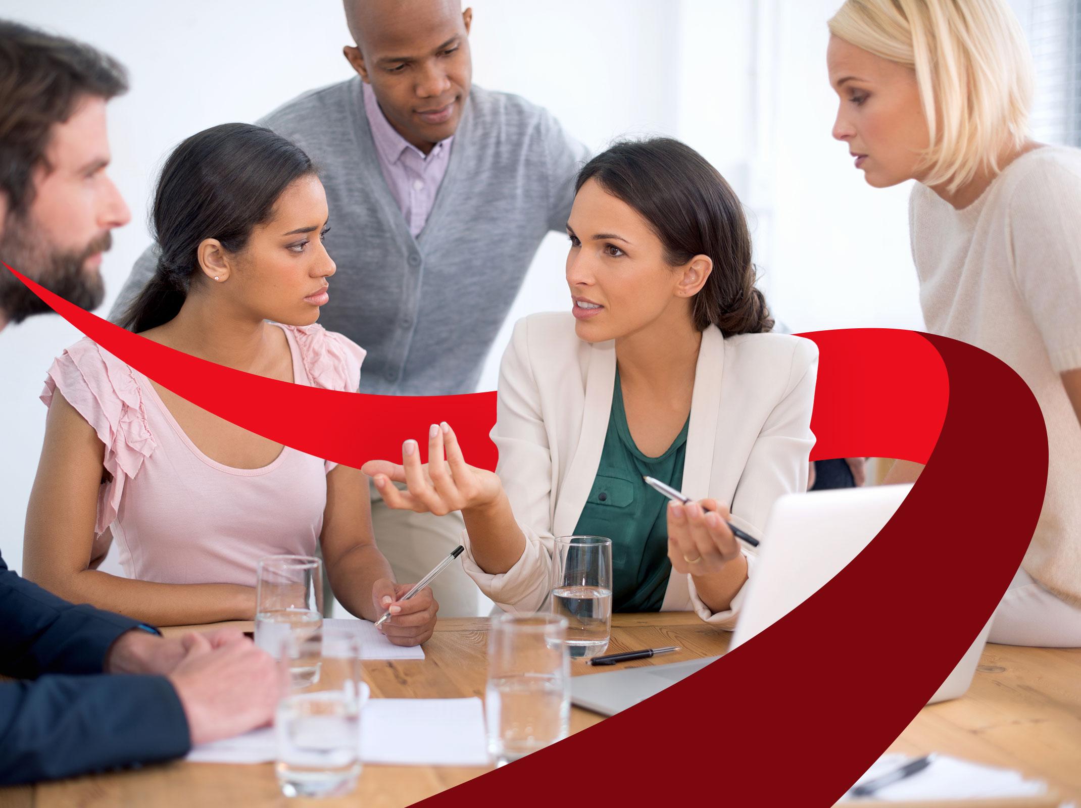 Business professionals working together positively to respond to a new change