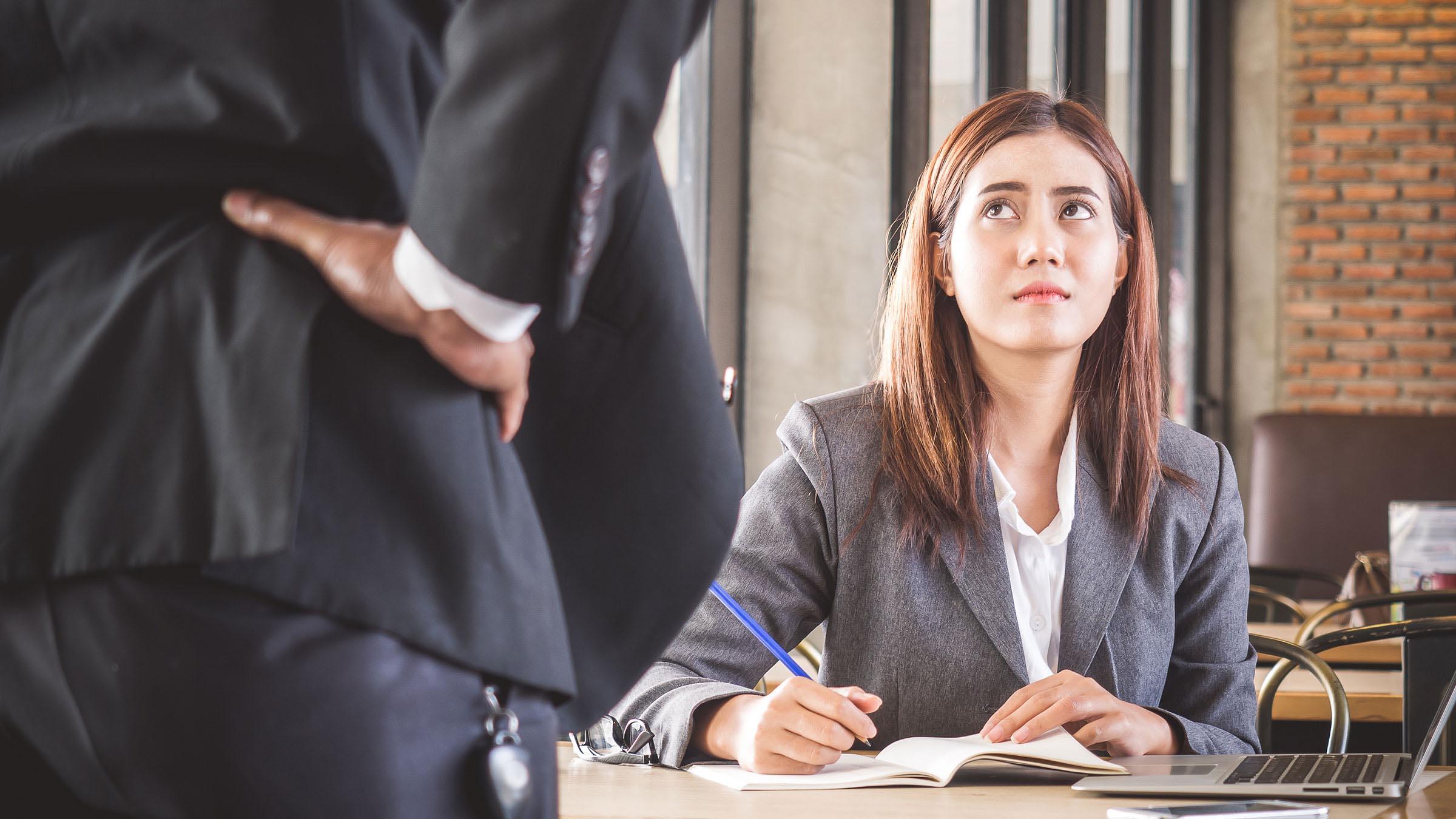Professional woman feeling threatened
