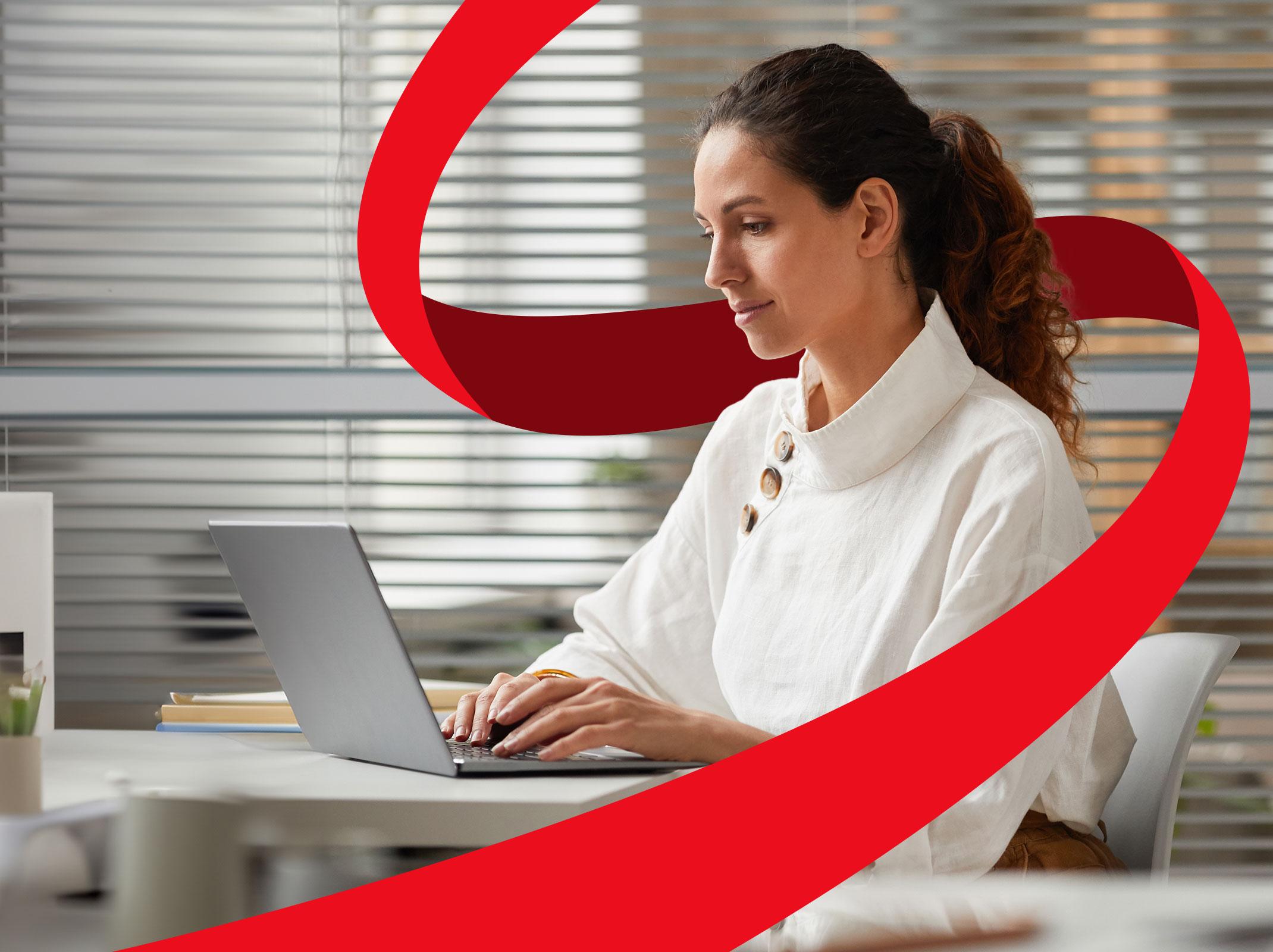 Intelligent woman typing on computer