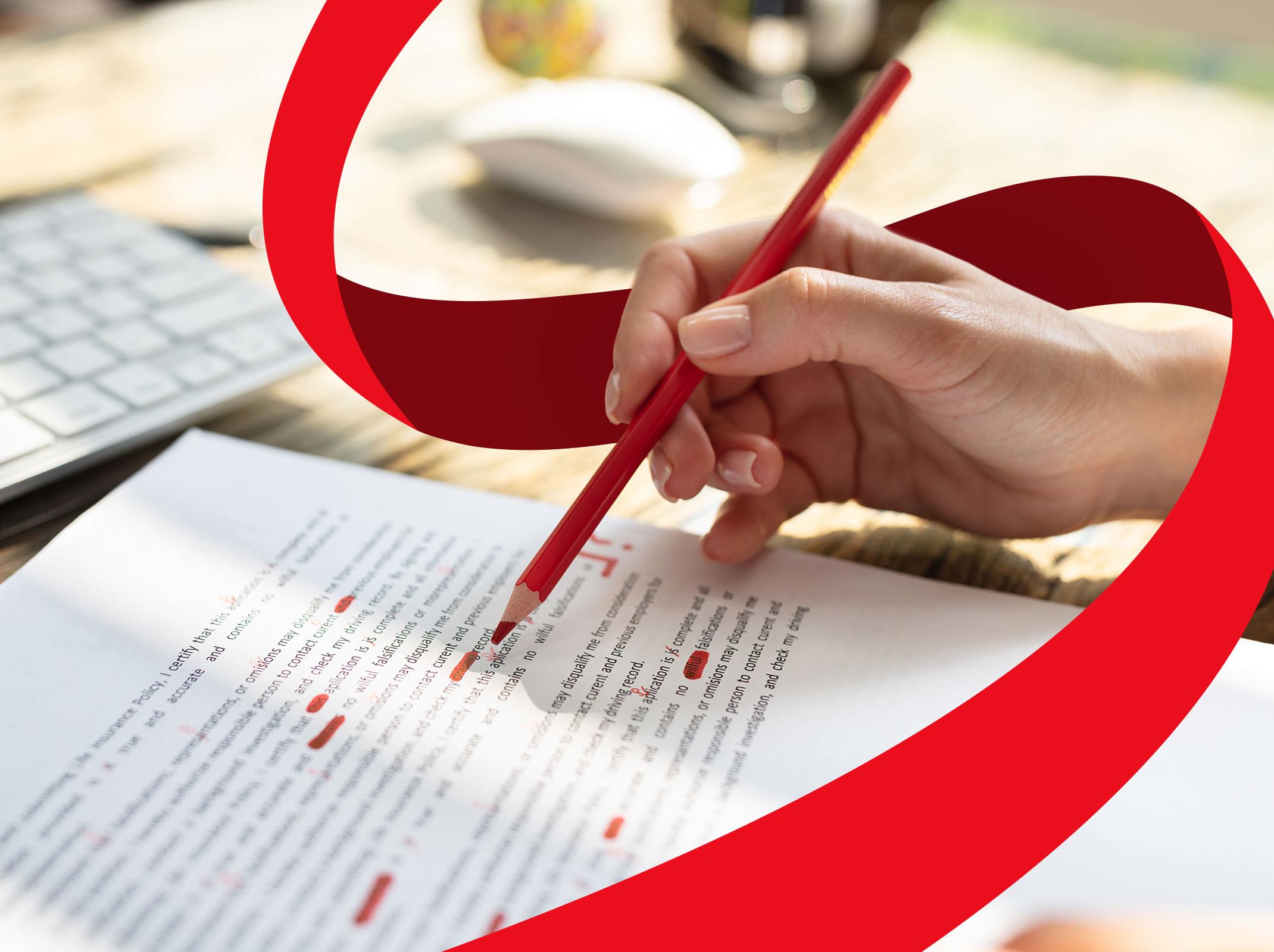 Business professional correcting grammar and punctuation