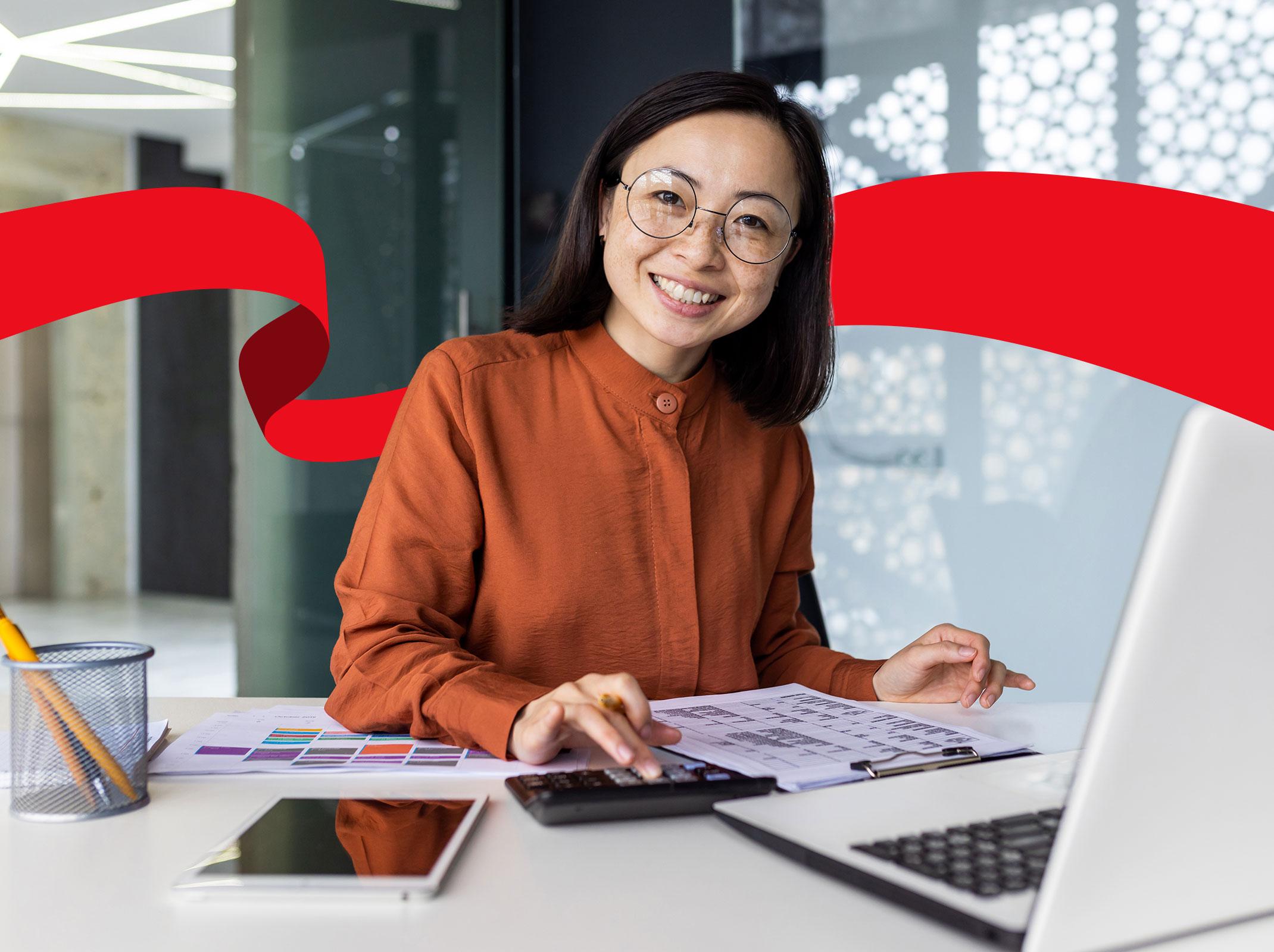 Administrative professional working with financial data