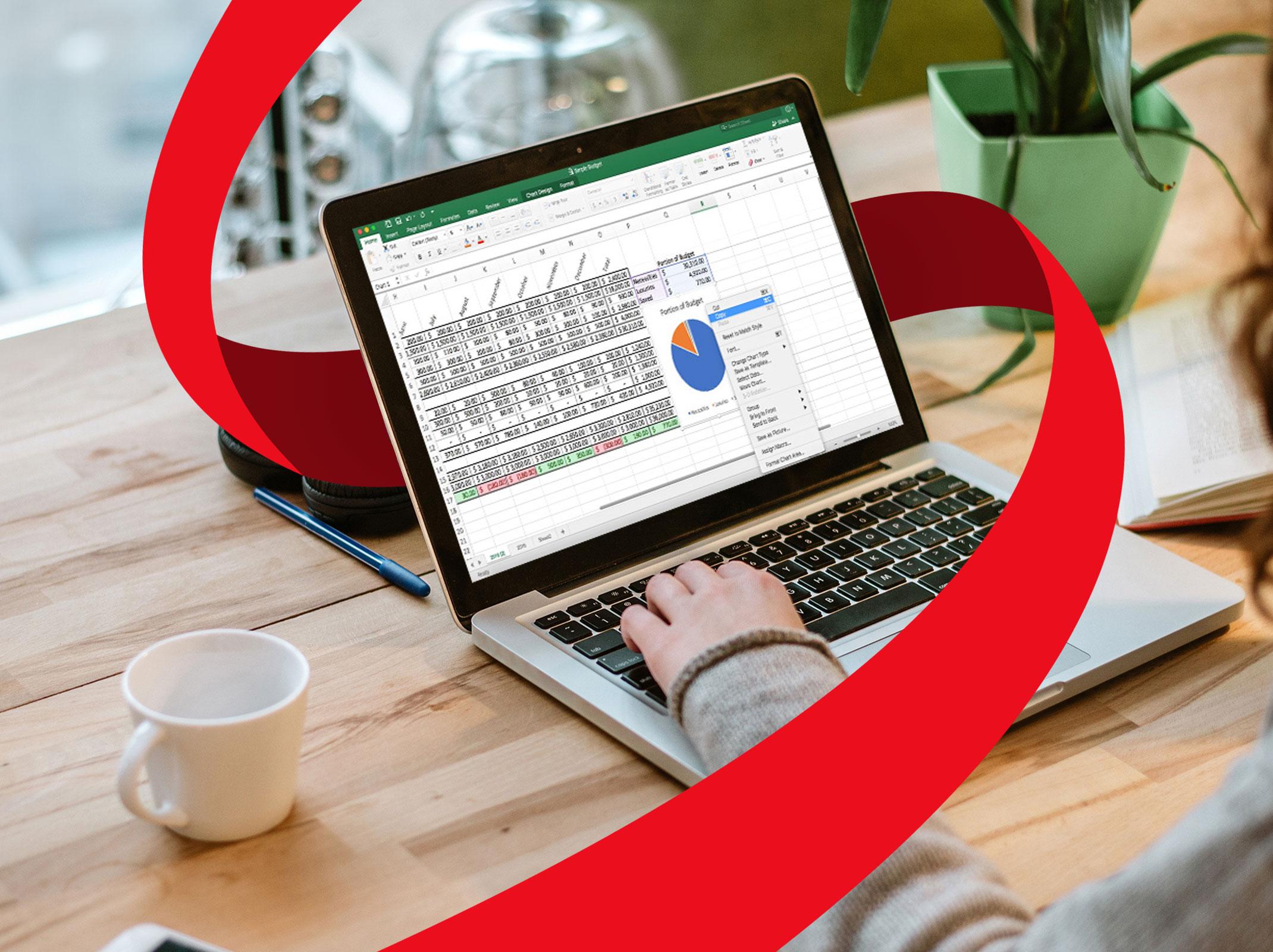 Business professional using an Excel spreadsheet for data analysis