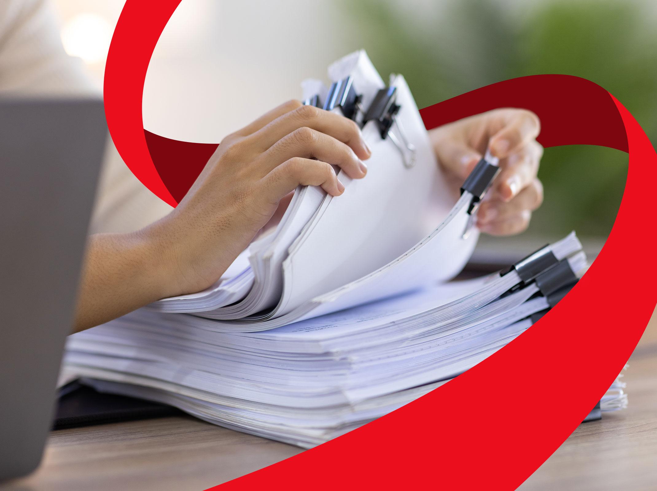 HR professional sorting important documents
