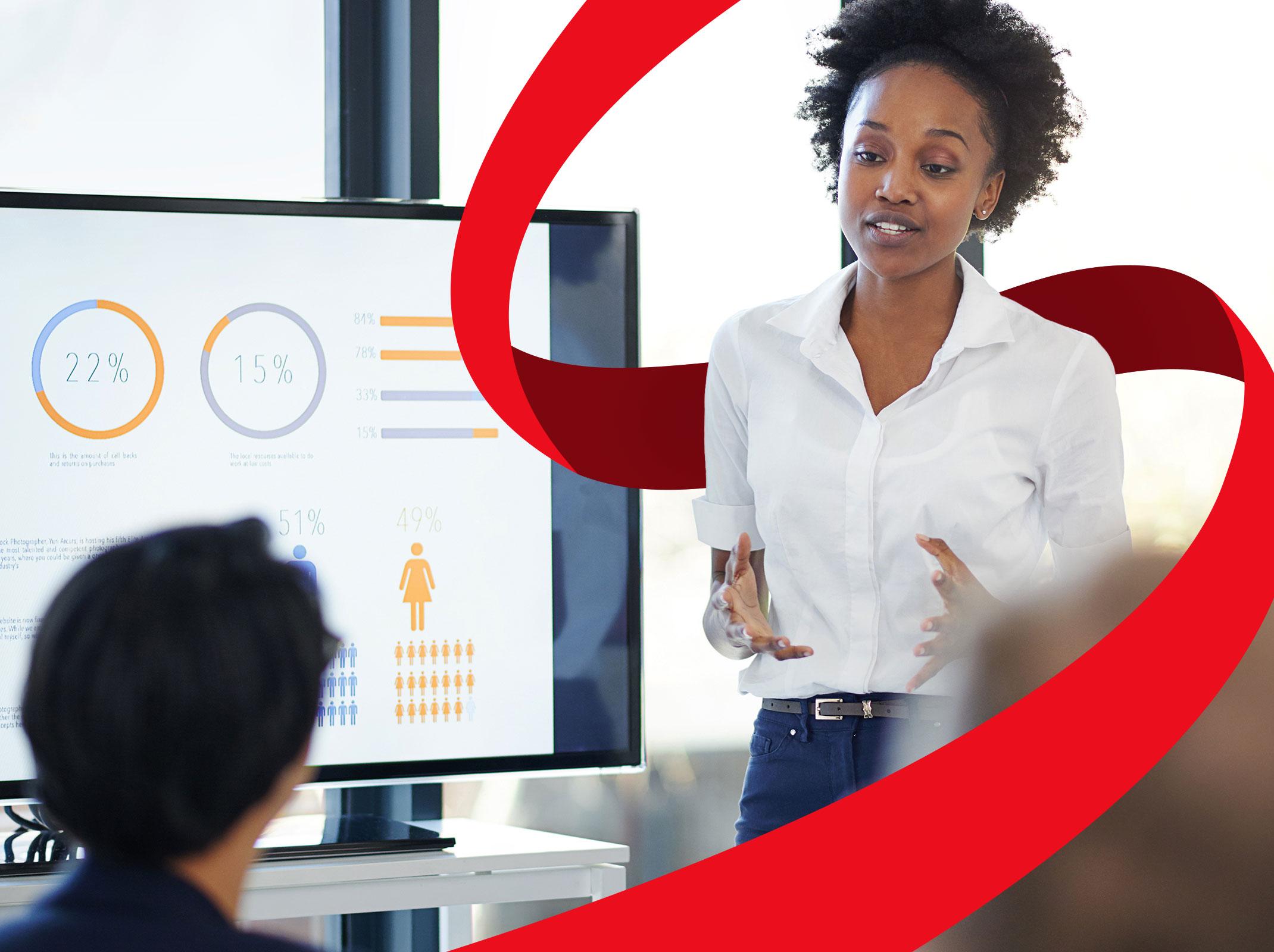Business professional giving a PowerPoint presentation