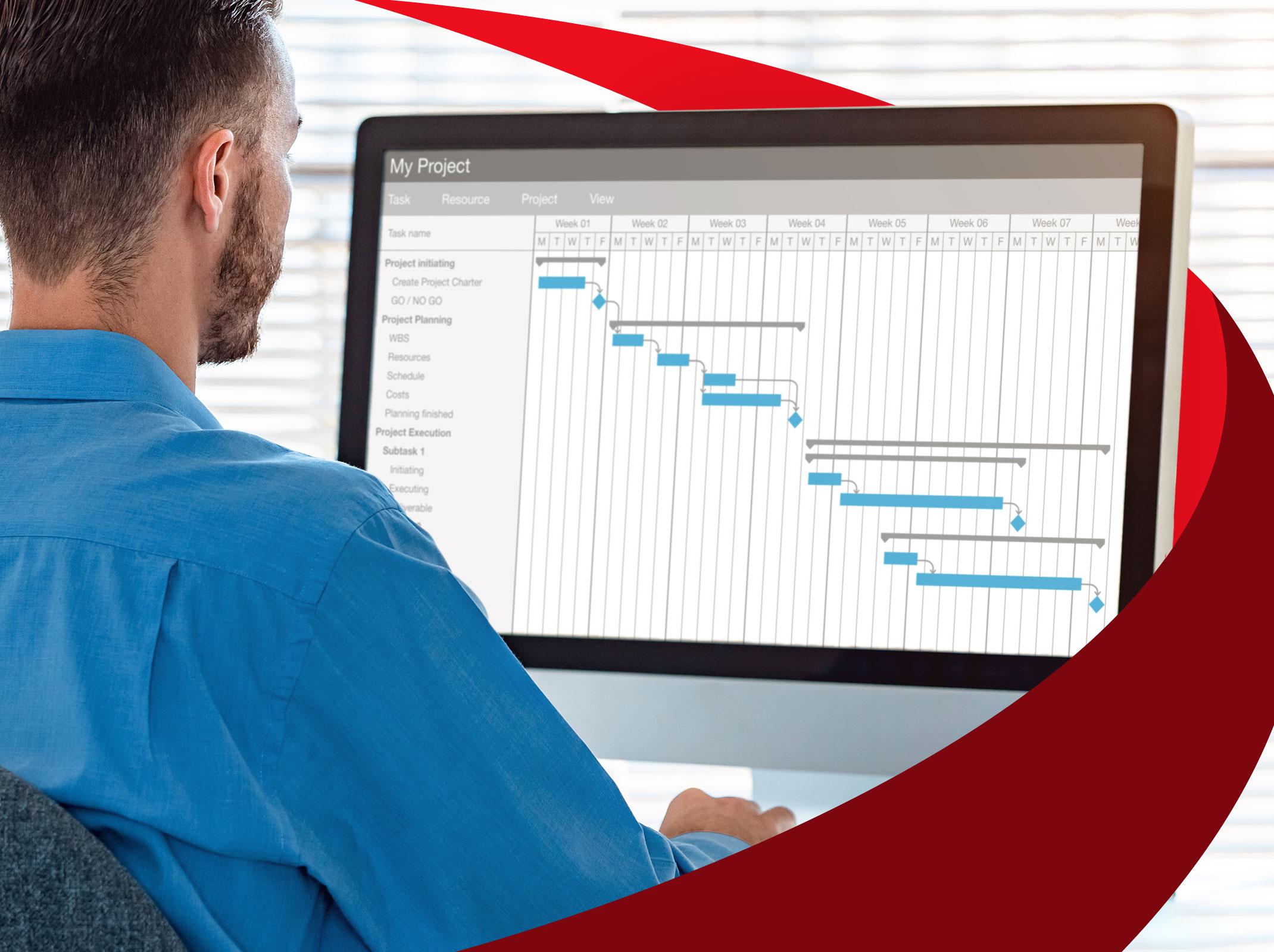 Project Manager using Excel for project planning, tracking and reporting