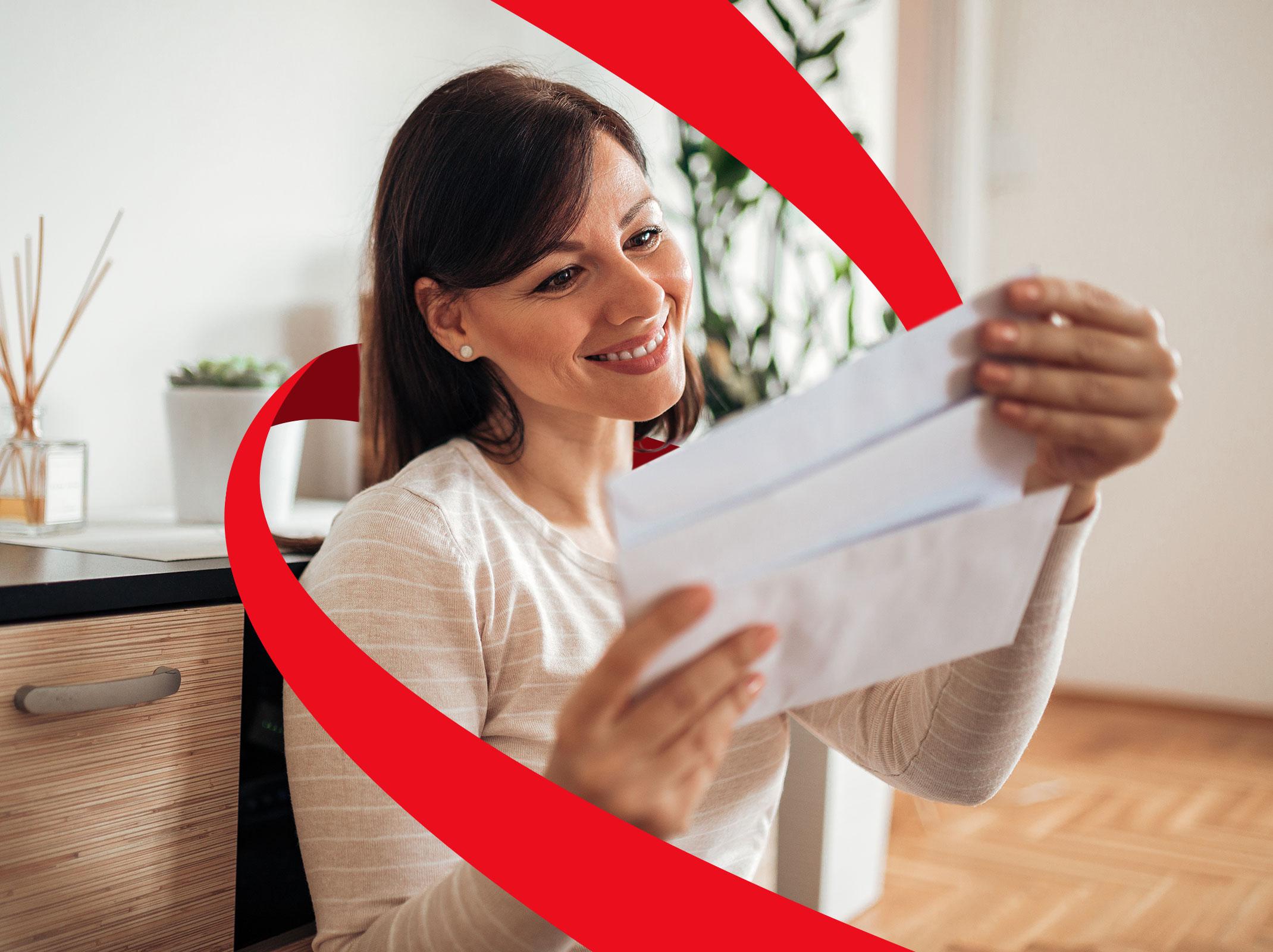 HR professional reviewing a document at a desk