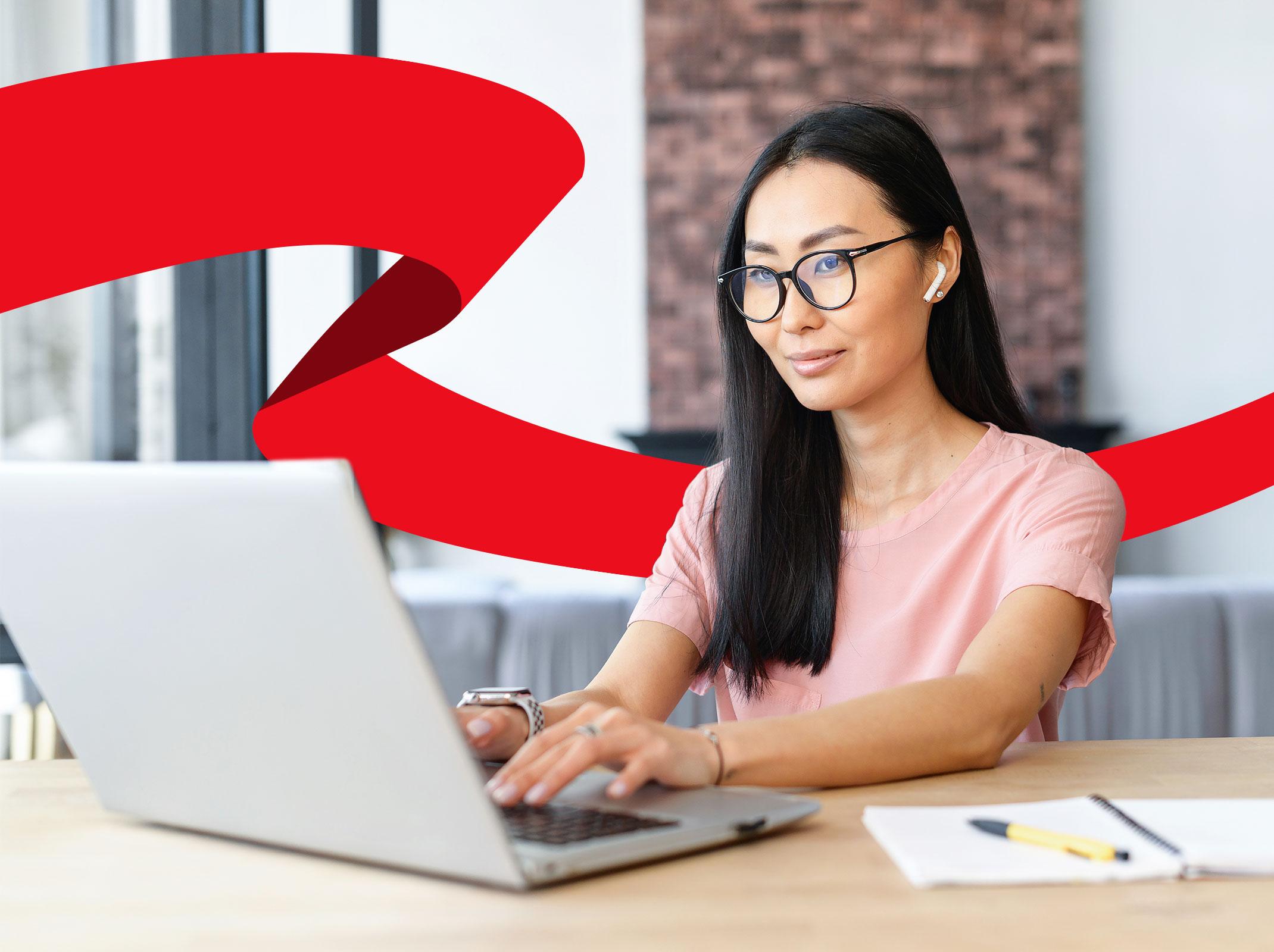 Accounting professional working on a laptop