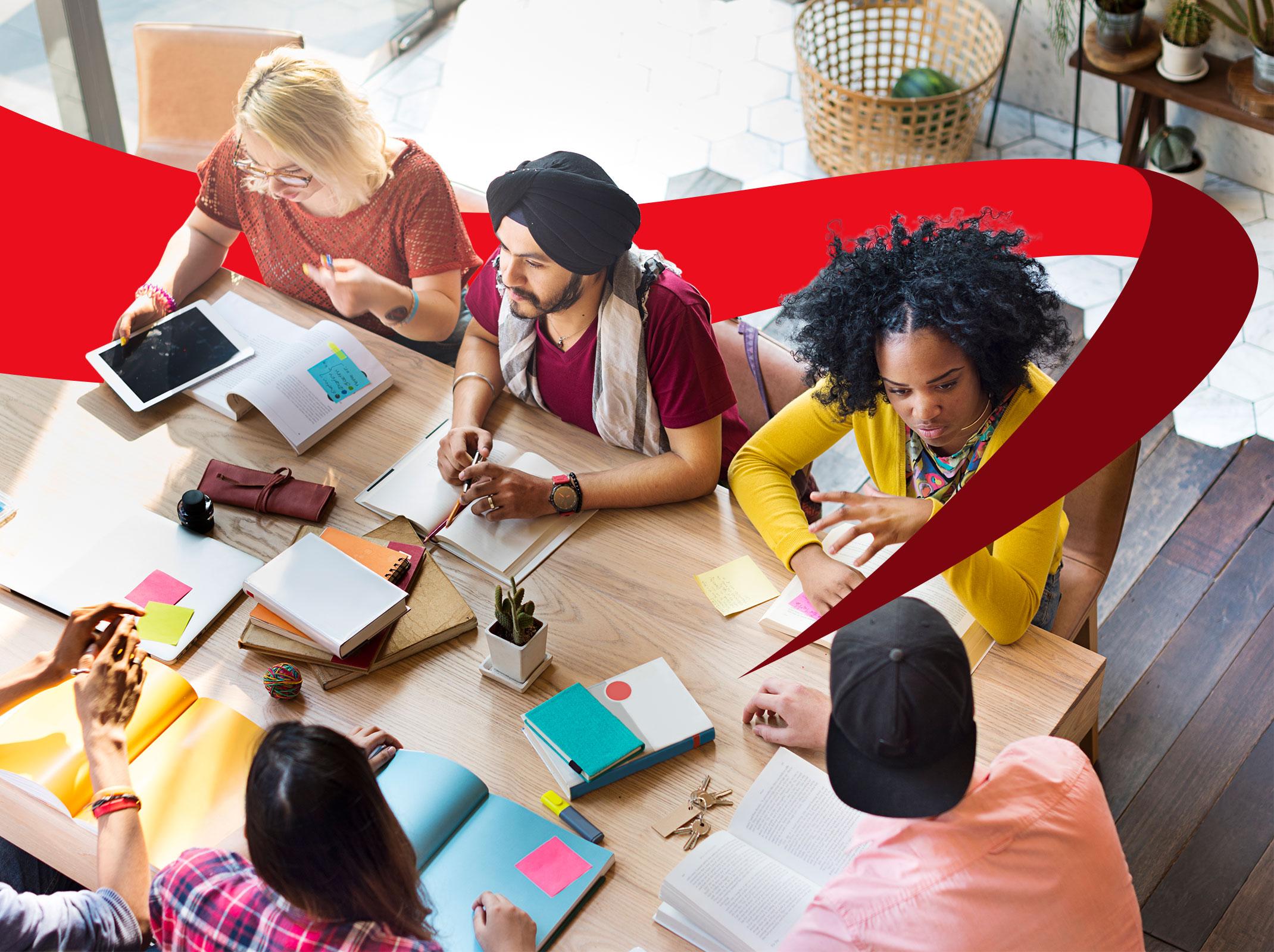 A diverse group of people meeting in the office